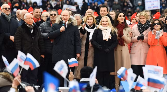 Кандидат в президенты РФ Владимир Путин прибыл на стадион «Лужники», где проходит митинг в поддержку его кандидатуры на выборах. Фото: Рейтер