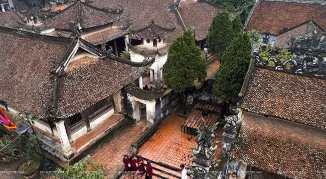 Общинный дом Хунгло с древними архитектурными особенностями. Фото: VNP