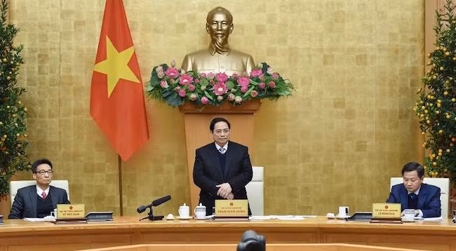 Премьер-министр Фам Минь Тьинь выступает на заседании. Фото: Чан Хай