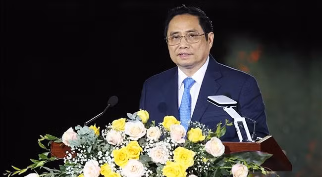 Премьер-министр Фам Минь Тьинь выступает с речью. Фото: VNA