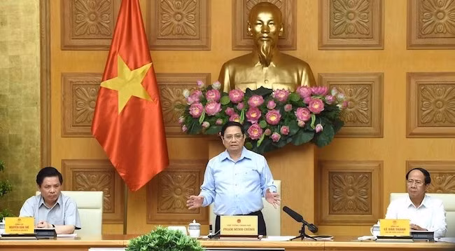 Премьер-министр Фам Минь Тьинь выступает на конференции. Фото: Чан Хай