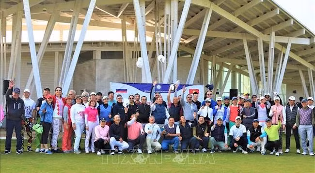 Участники гольф-турнира. Фото: VNA