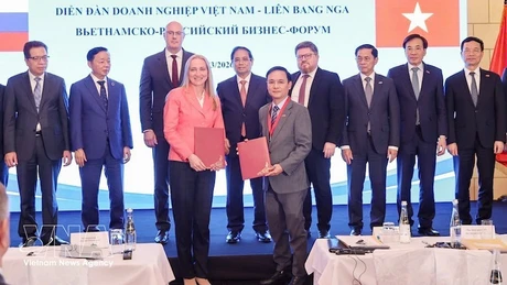 Церемония обмена документами о сотрудничестве между предприятиями Вьетнама и РФ. Фото: ВИА