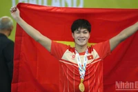 Чан Хынг Нгуен завоевал золотую медаль в плавании на дистанции 200 м комплексным стилем. (Фото: Минь Хоанг)