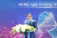 Премьер-министр Фам Минь Тьинь выступает с речью. (Фото: Чан Хай)