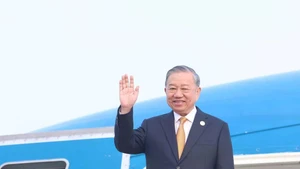 Генеральный секретарь ЦК КПВ То Лам.