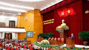 Генеральный секретарь То Лам выступает с заключительным словом на XIV Пленуме Центрального комитета партии XIII созыва. (Фото: ВИА)