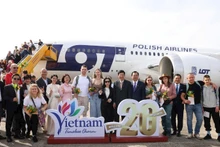 Церемония встречи 20-миллионного иностранного туриста, прибывшего во Вьетнам. Фото: Министерство культуры, спорта и туризма Вьетнама