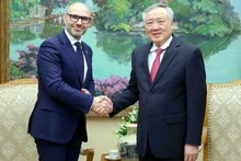 Постоянный вице-премьер Нгуен Хоа Бинь и Генеральный секретарь ППТС Марчин Чепелак. Фото: VGP