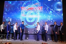 Делегаты принимают участие в церемонии запуска новой версии Технологической биржи города Хошимина. Фото: ВИА