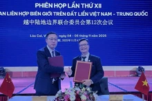 Главы двух делегаций. Фото: baoquocte.vn