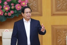 Премьер-министр Фам Минь Тьинь выступает на мероприятии. Фото: ВИА