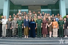 Делегаты мероприятия. Фото: qdnd.vn