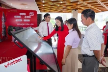 Знакомство с платформами и решениями цифровой трансформации, направленными на развитие цифрового правительства и цифровой экономики в провинции Тэйнинь. Фото: ВИА