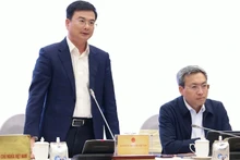 Заместитель Председателя Госбанка Вьетнама Фам Тхань Ха выступает на пресс-конференции. Фото: VGP 