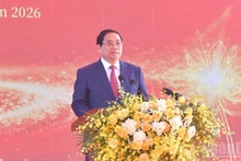 Премьер-министр Фам Минь Тьинь выступает на церемонии. Фото: Тхань Жанг