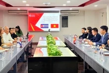 Переговоры между Замминистра Нгуен Тхань Тинем и Министром юстиции Кубы Росабелем Гамоном Верде. Фото: Посольство Вьетнама на Кубе