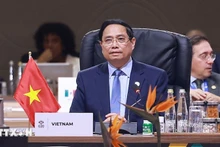 Премьер-министр Фам Минь Тьинь выступает на 3-й дискуссии саммита G20. Фото: ВИА