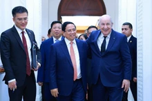 Премьер-министр Вьетнама Фам Минь Тьинь и Президент Алжира Абдельмаджид Теббун. Фото: ВИА