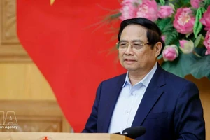 Премьер-министр Фам Минь Тьинь провёл рабочее совещание с Советом по консультированию в области политики для обсуждения социально-экономической ситуации и новых мировых тенденций. Фото: ВИА.