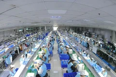 Производственная линия электронной продукции в компании Suntech - промышленный кластер Тханьван. Фото: ВИА