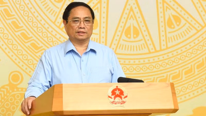 Премьер-министр Фам Минь Тьинь выступает на конференции. Фото: Чан Хай