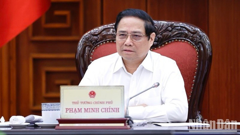 Премьер-министр Фам Минь Тьинь на заседании. Фото: Чан Хай Премьер-министр Фам Минь Тьинь на заседании. Фото: Чан Хай