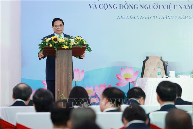 Премьер-министр Фам Минь Тьинь выступает с речью на встрече с сотрудниками Посольства и представителями вьетнамской диаспоры в Индии. Фото: ВИА Премьер-министр Фам Минь Тьинь выступает с речью на встрече с сотрудниками Посольства и представителями вьетнамской диаспоры в Индии. Фото: ВИА