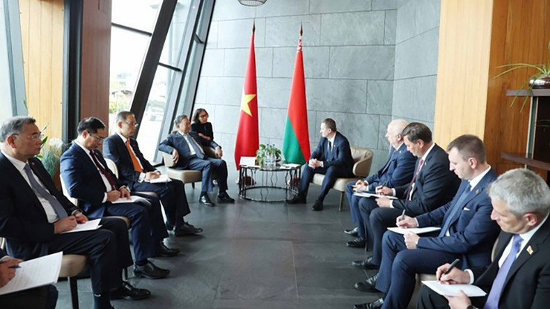 На встрече Генерального секретаря ЦК КПВ То Лама с Премьер-министром Беларуси Александром Турчиным. Фото: ВИA