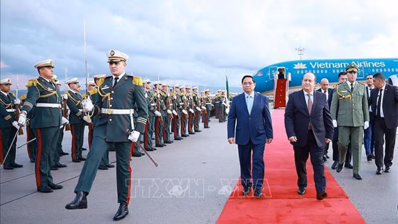 vna-potal-thu-tuong-va-phu-nhan-bat-dau-chuyen-tham-chinh-thuc-algeria-stand-2.jpg