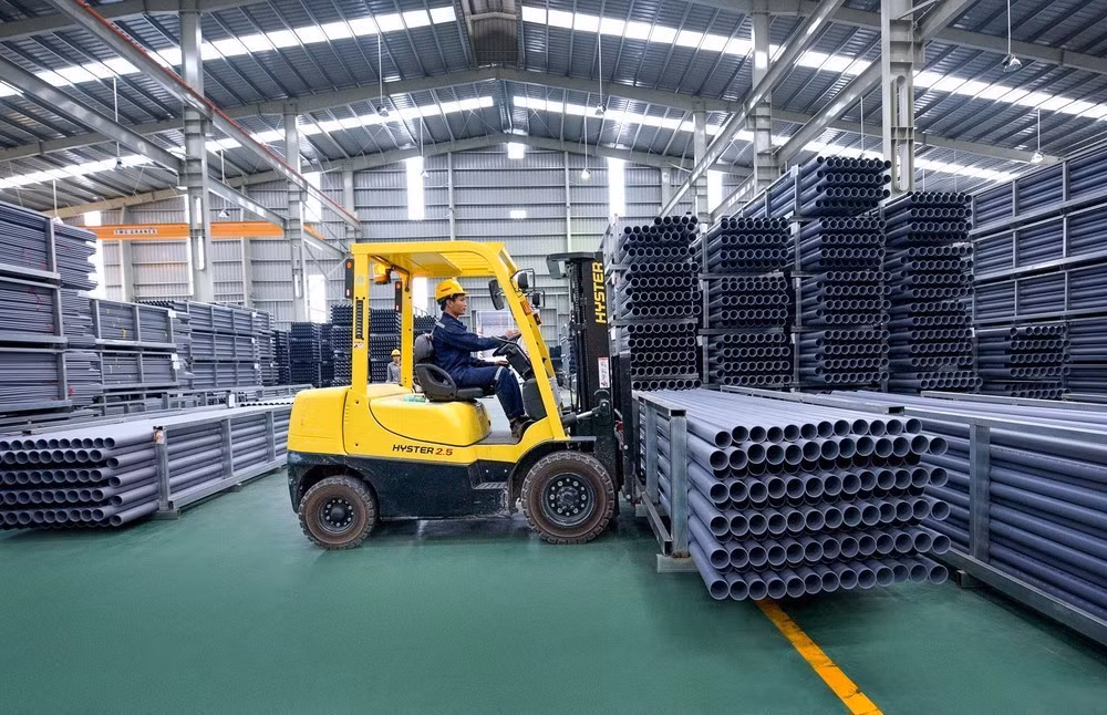 Производство пластиковых труб в АО Hoa Sen Plastic, входящей в корпорацию Хоашен. (Фото: Дык Хюи)