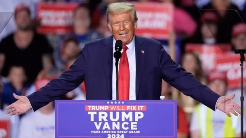 5 ноября 2024 года кандидат от Республиканской партии Дональд Трамп одерживает убедительную победу на президентских выборах в США 2024 года, набирая более 270 голосов выборщиков, необходимых по закону, и побеждает кандидата от Демократической партии Камалу Харрис, становясь 47-м президентом США. На снимке: кандидат от Республиканской партии Дональд Трамп (США) во время предвыборного митинга на стадионе «Ван Андел Арена» 5 ноября 2024 года. Фото: AP/ВИA 5 ноября 2024 года кандидат от Республиканской партии Дональд Трамп одерживает убедительную победу на президентских выборах в США 2024 года, набирая более 270 голосов выборщиков, необходимых по закону, и побеждает кандидата от Демократической партии Камалу Харрис, становясь 47-м президентом США. На снимке: кандидат от Республиканской партии Дональд Трамп (США) во время предвыборного митинга на стадионе «Ван Андел Арена» 5 ноября 2024 года. Фото: AP/ВИA